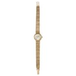 A LADY'S 9 CARAT GOLD OMEGA BRACELET WATCH