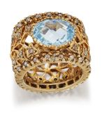 A BLUE TOPAZ AND DIAMOND DRESS RING