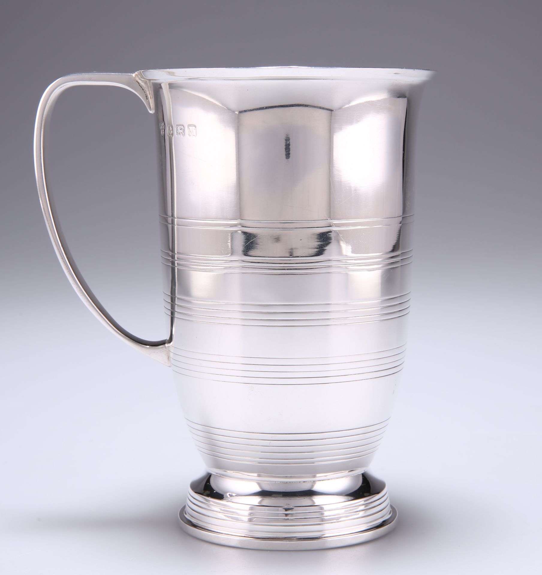 AN ART DECO SILVER MUG