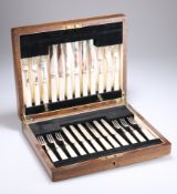 A SET OF EDWARDIAN SILVER-PLATED AND MOTHER-OF-PEARL HANDLED FRUIT KNIVES AND FORKS
