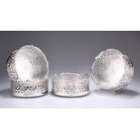 AN EXCEPTIONAL SET OF FOUR EARLY VICTORIAN SILVER COASTERS