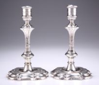 A PAIR OF IRISH CAST SILVER CANDLESTICKS, CIRCA 1750