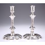 A PAIR OF IRISH CAST SILVER CANDLESTICKS, CIRCA 1750