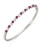 A RUBY AND DIAMOND BANGLE