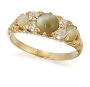 A CAT'S EYE CHRYSOBERYL AND DIAMOND RING