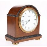 A SMALL EDWARDIAN MAHOGANY MANTEL CLOCK