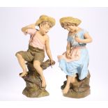 A PAIR OF GOLDSCHEIDER TERRACOTTA FIGURES