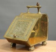 A VICTORIAN AESTHETIC BRASS COAL SCUTTLE