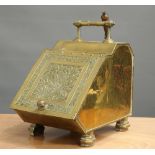 A VICTORIAN AESTHETIC BRASS COAL SCUTTLE