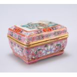 A SMALL CHINESE FAMILLE ROSE BOX AND COVER