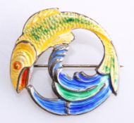 A SILVER AND ENAMEL BROOCH