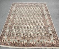 A PERSIAN BOTEH CARPET