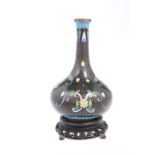 A CHINESE CLOISONNE ENAMEL BOTTLE VASE