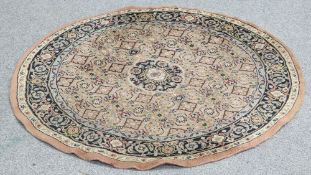 A CIRCULAR INDIAN RUG OF HERATI DESIGN