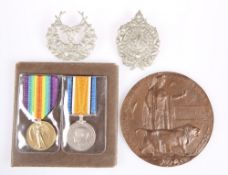 A FIRST WORLD WAR PAIR AND BRONZE MEMORIAL PLAQUE