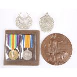 A FIRST WORLD WAR PAIR AND BRONZE MEMORIAL PLAQUE