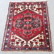 A PERSIAN HAMADAN CARPET