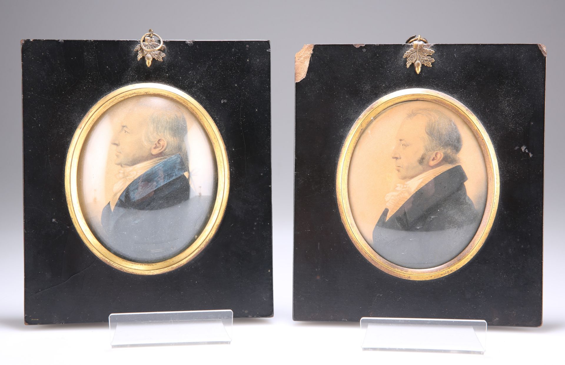 A PAIR OF EARLY 19TH CENTURY PORTRAIT MINIATURES ON PAPER