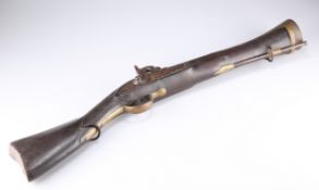 A VERY HEAVY BRASS BARRELLED BLUNDERBUSS OF EASTERN ORIGIN