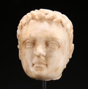 A MARBLE HEAD OF A YOUNG MAN