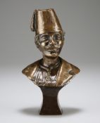 A CAST BRONZE HEAD AND SHOULDERS STUDY OF A MOUSTACHIOED MALE WEARING A FEZ