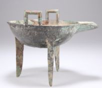 A BRONZE TRIPOD RITUAL VESSEL, EASTERN ZHOU DYNASTY OR LATER