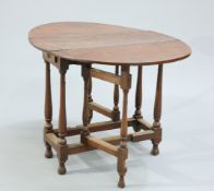 A SMALL OAK GATELEG TABLE