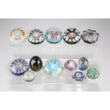 A GROUP OF GLASS PAPERWEIGHTS