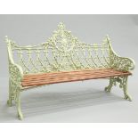 A GREEN PAINTED METAL GARDEN BENCH