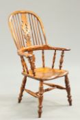 A 19TH CENTURY YEW WOOD BROAD-ARM WINDSOR CHAIR, SOUTH YORKSHIRE