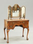 A GEORGIAN STYLE WALNUT DRESSING TABLE