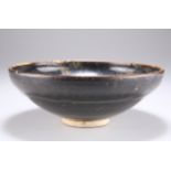 A LARGE RUSSET-STREAKED BLACK GLAZED BOWL, YUAN DYNASTY