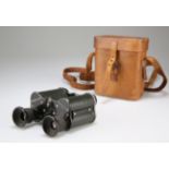 A CASED PAIR OF COMPACT BINOCULARS BY DOLLOND, LONDON