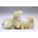 A CHINESE JADE CARVING OF TWO HORSES