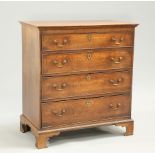 A GEORGE III OAK CHEST OF DRAWERS