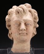 A TERRACOTTA HEAD