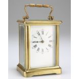 A BRASS CASED CARRIAGE CLOCK