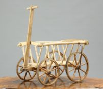 A VICTORIAN PAINTED PINE DOG CART