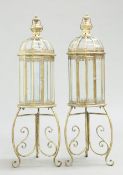 A PAIR OF PERIOD STYLE BRASS LANTERNS ON STANDS
