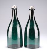 A PAIR OF EARLY 19TH CENTURY GREEN GLASS FLASK DECANTERS WITH SILVER-MOUNTED STOPPERS