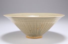 A NORTHERN SONG-JIN DYNASTY YAOZHOU CELADON MOULDED CONICAL BOWL