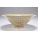 A NORTHERN SONG-JIN DYNASTY YAOZHOU CELADON MOULDED CONICAL BOWL