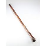 A 19TH CENTURY JAPANESE CARVED BAMBOO AND IVORY WALKING STICK