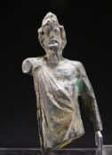 A BRONZE FIGURE OF A NOBLEMAN