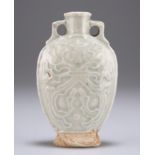 A SMALL LATE YUAN DYNASTY CELADON BOTTLE FLASK