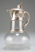 A CUT GLASS BALUSTER SHAPE CLARET JUG MOUNTED WITH SILVER PLATE