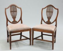 A PAIR OF GEORGE III MAHOGANY HEPPLEWHITE STYLE SIDE CHAIRS