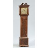 A CARVED OAK LONGCASE CLOCK