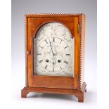 AN EARLY 20TH CENTURY FRENCH WALNUT MANTEL CLOCK