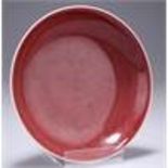 A CHINESE OX-BLOOD GLAZED PORCELAIN DISH